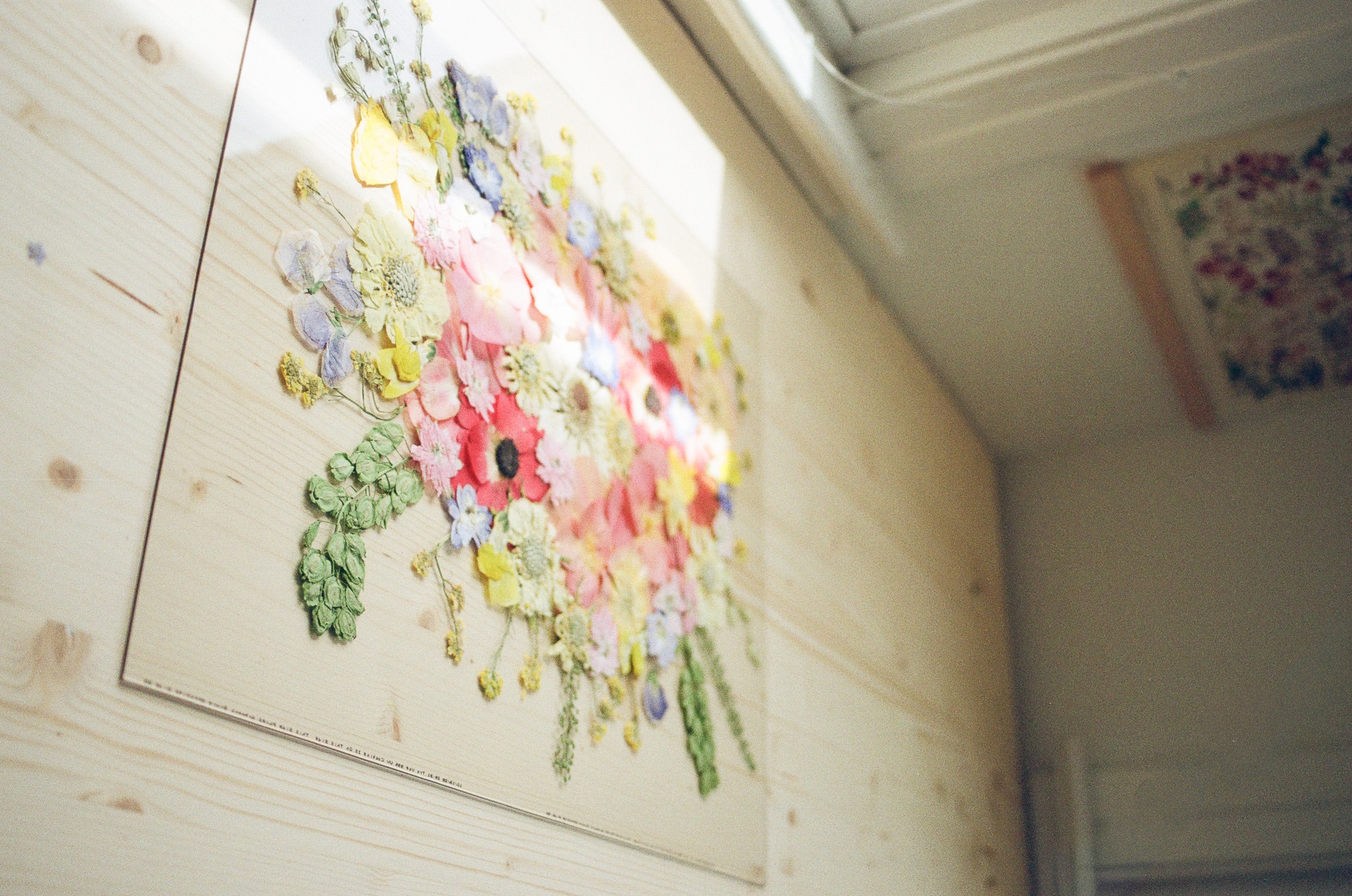 A finished bouquet preserved as pressed-flower artwork by Pressed Petals Studio